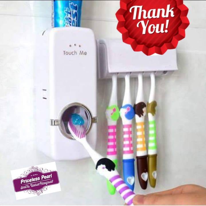 Toothpaste paste dispenser with toothbrush holder